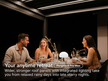 People sitting around a table at night.