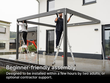 Two people assembling a metal frame of a pergola