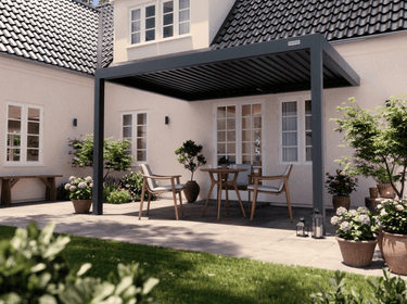 Patio area with pergola, outdoor furniture, and plants in a residential setting