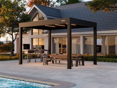 Outdoor pergola with seating area near a house and pool