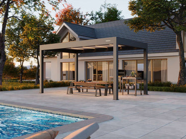 Patio with pergola, outdoor furniture, and pool area in front of a house.