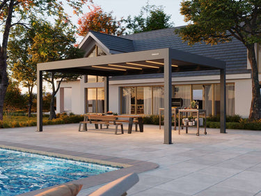 Patio with pergola, outdoor furniture, and pool area in front of a house.