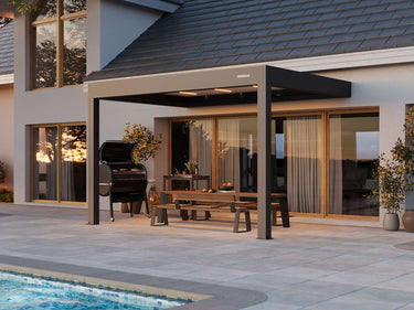 Outdoor patio area with pergola, pool, and house exterior