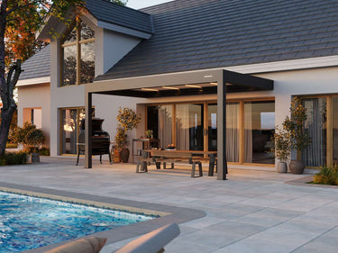 Modern house with a pool and outdoor seating area