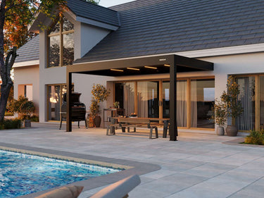 Modern house with a pool and outdoor seating area