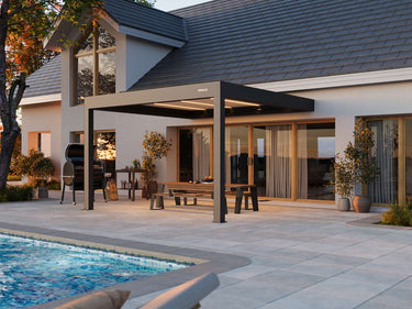 Modern patio with pergola, pool, and outdoor furniture