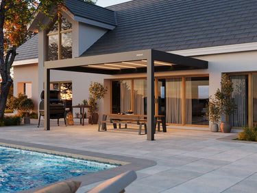 Modern patio with pergola, pool, and outdoor furniture