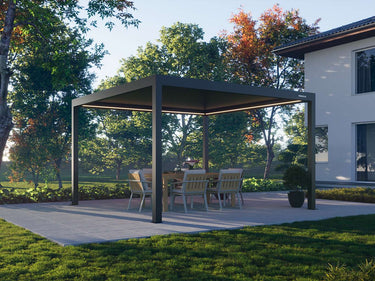 Pergola over a dining table in a garden setting with a house in the background.