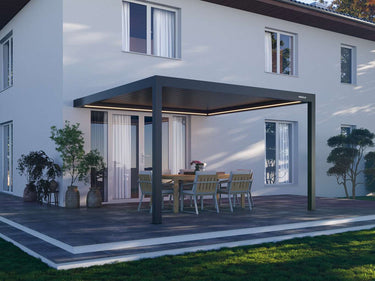 Modern house with a patio area featuring a pergola and outdoor furniture.